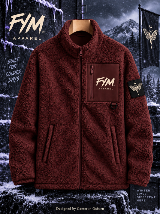 Burgundy women’s FYM Sherpa jacket with cream branding and moth sleeve patch in a snowy winter scene. Designed by Cameron Osborn.
